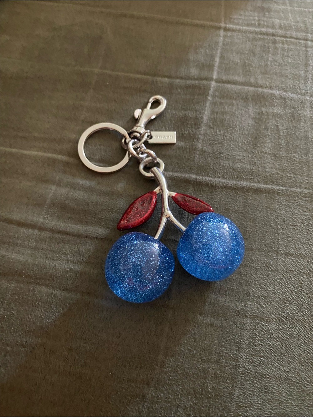Coach Blue Glitter Cherry Keyring with Red Leaf Accents